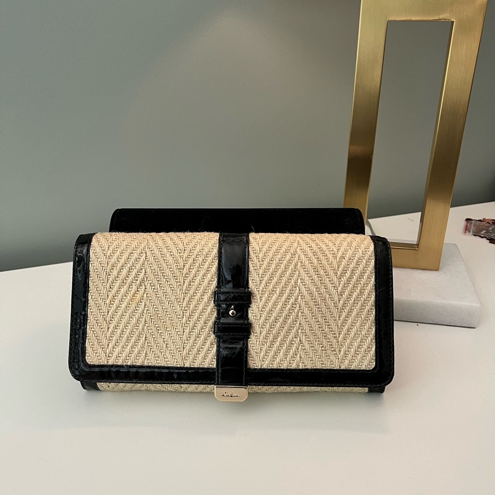 Like New - Cole Haan Black and Cream woven clutch with Patent Leather detail…